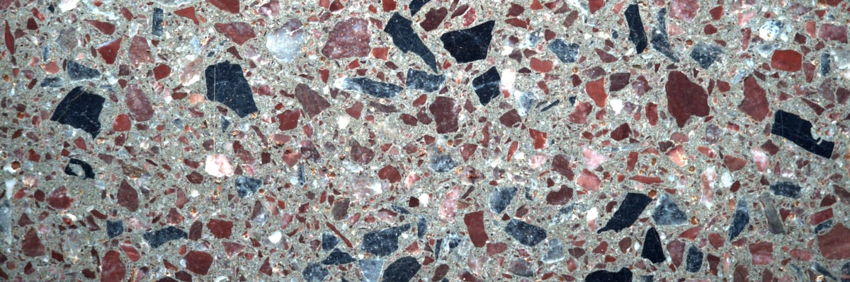 Terrazzo surface showcasing a decorative pattern of multicolored stone chips
